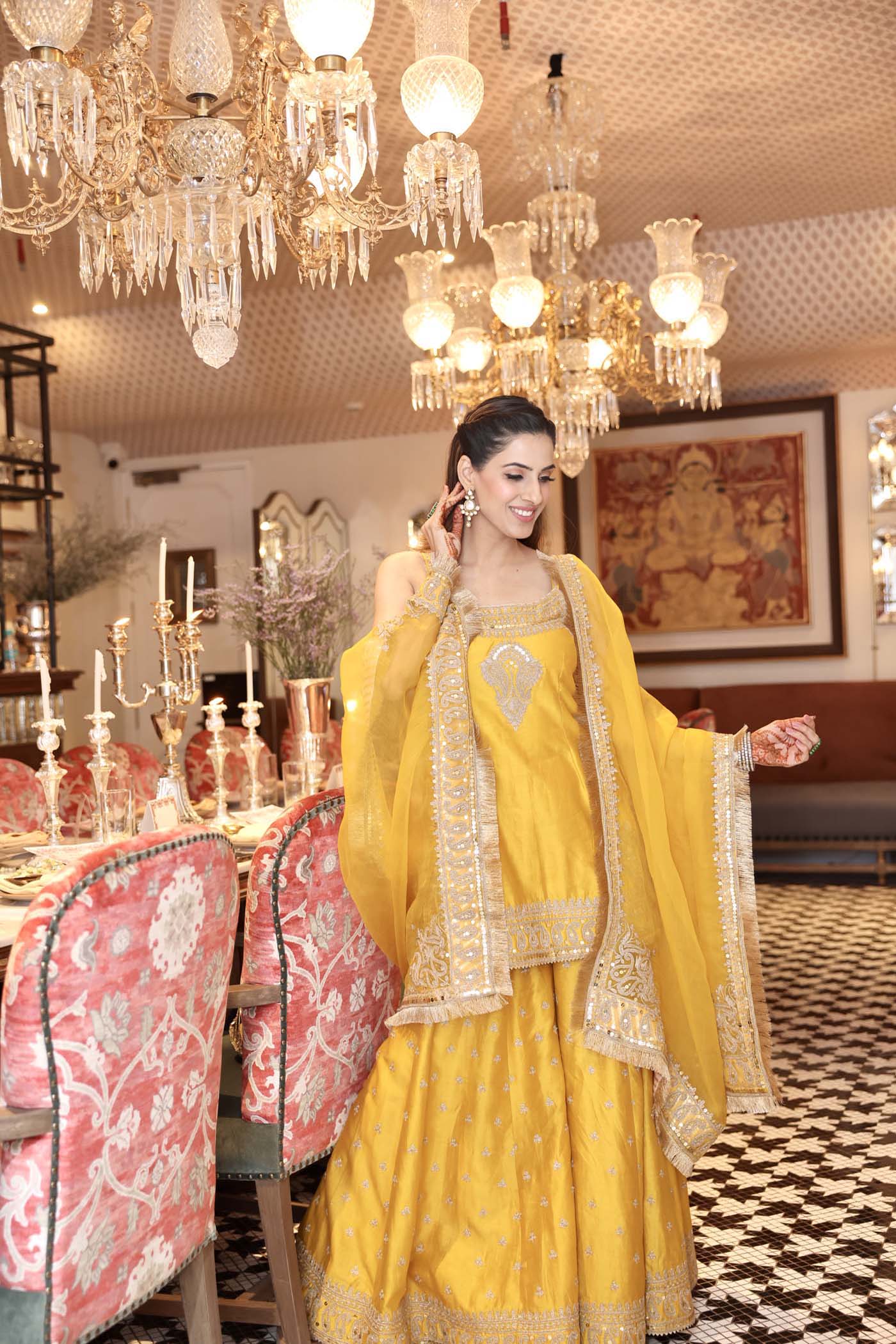 Shruti Juneja In AABROO - GLAZE MUSTARD SHORT KURTA WITH SHARARA AND DUPATTA