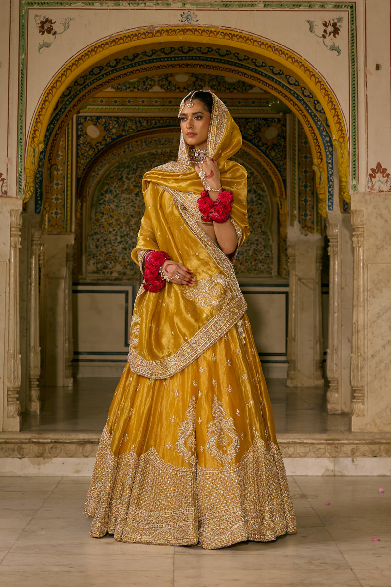 Aashina  - Dabka Zardozi Embroidered Pure Tissue Mustard Gold Lehenga Set