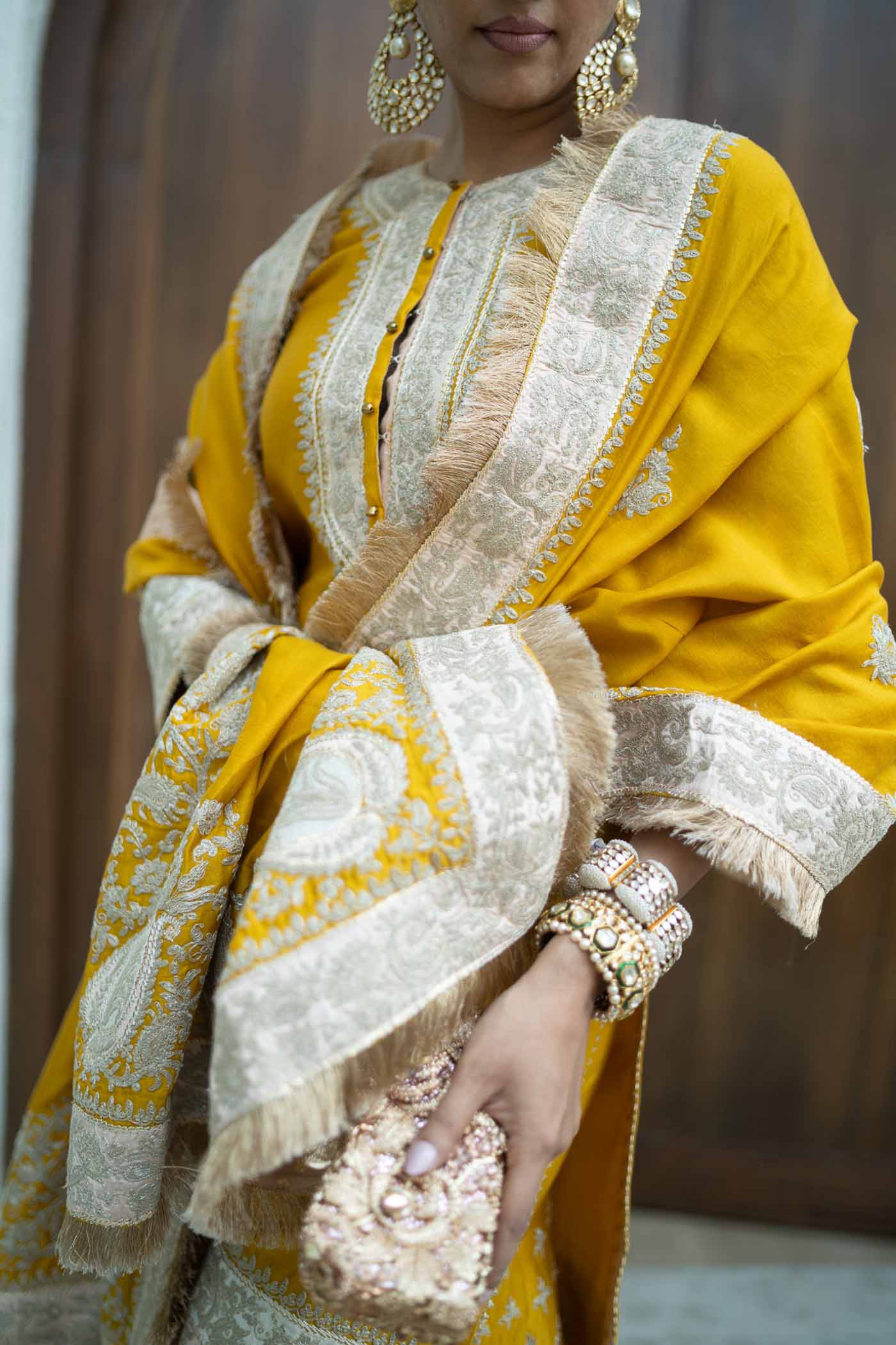 Alisha Pekha In RAINA - GLAZE MUSTARD SHORT KURTA WITH SHARARA AND ODHNI