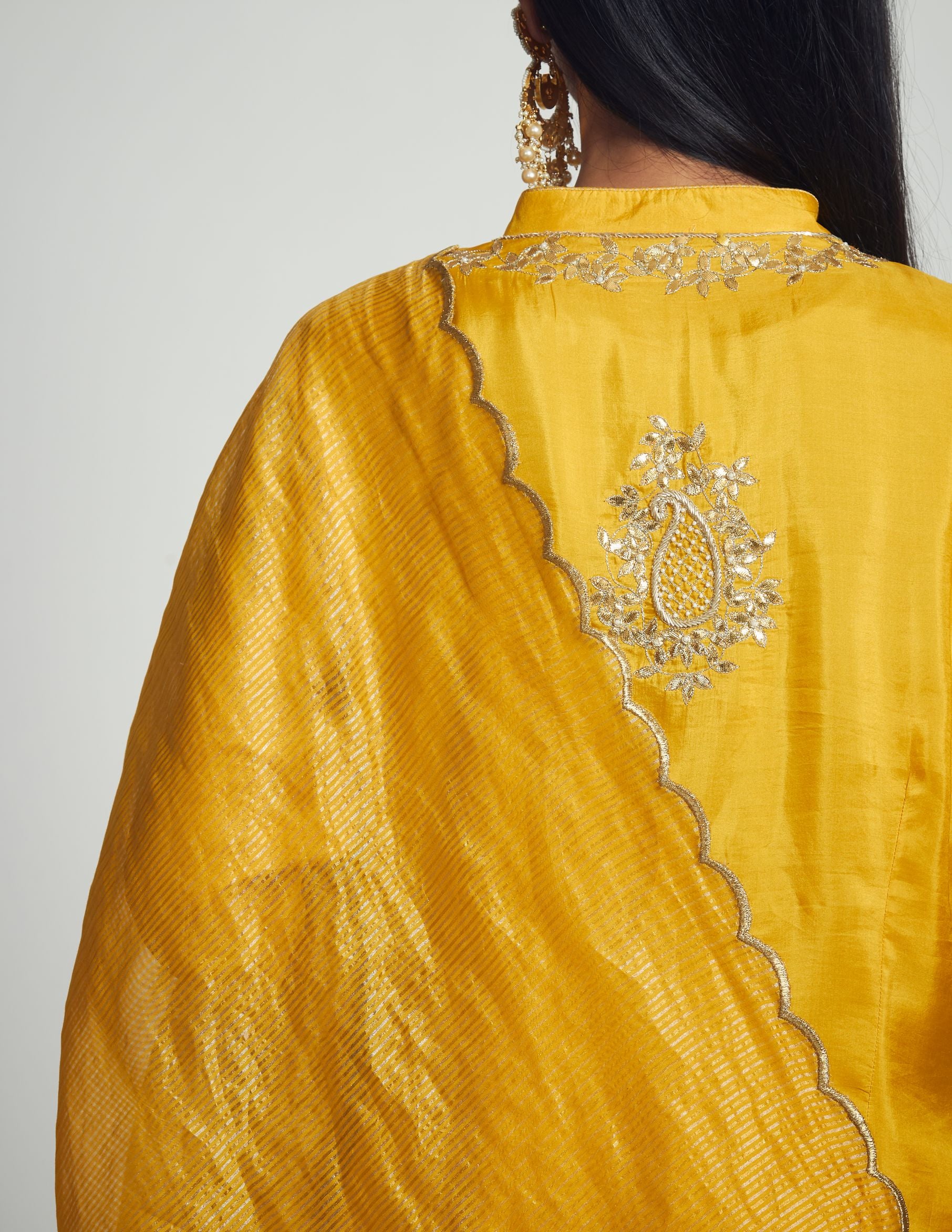 Nazish- Happy mustard Habutai silk embroidered ensemble