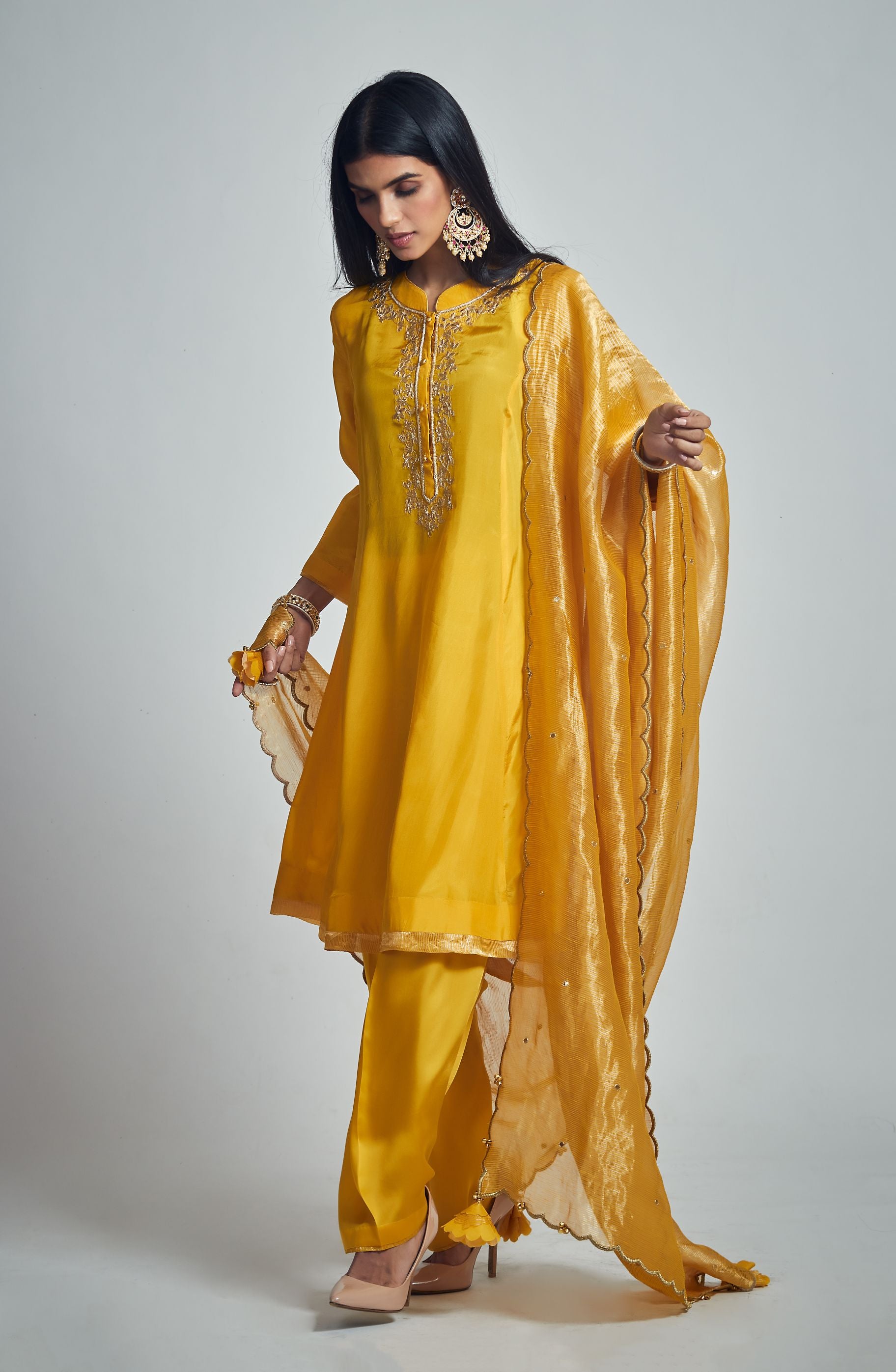 Nazish- Happy mustard Habutai silk embroidered ensemble