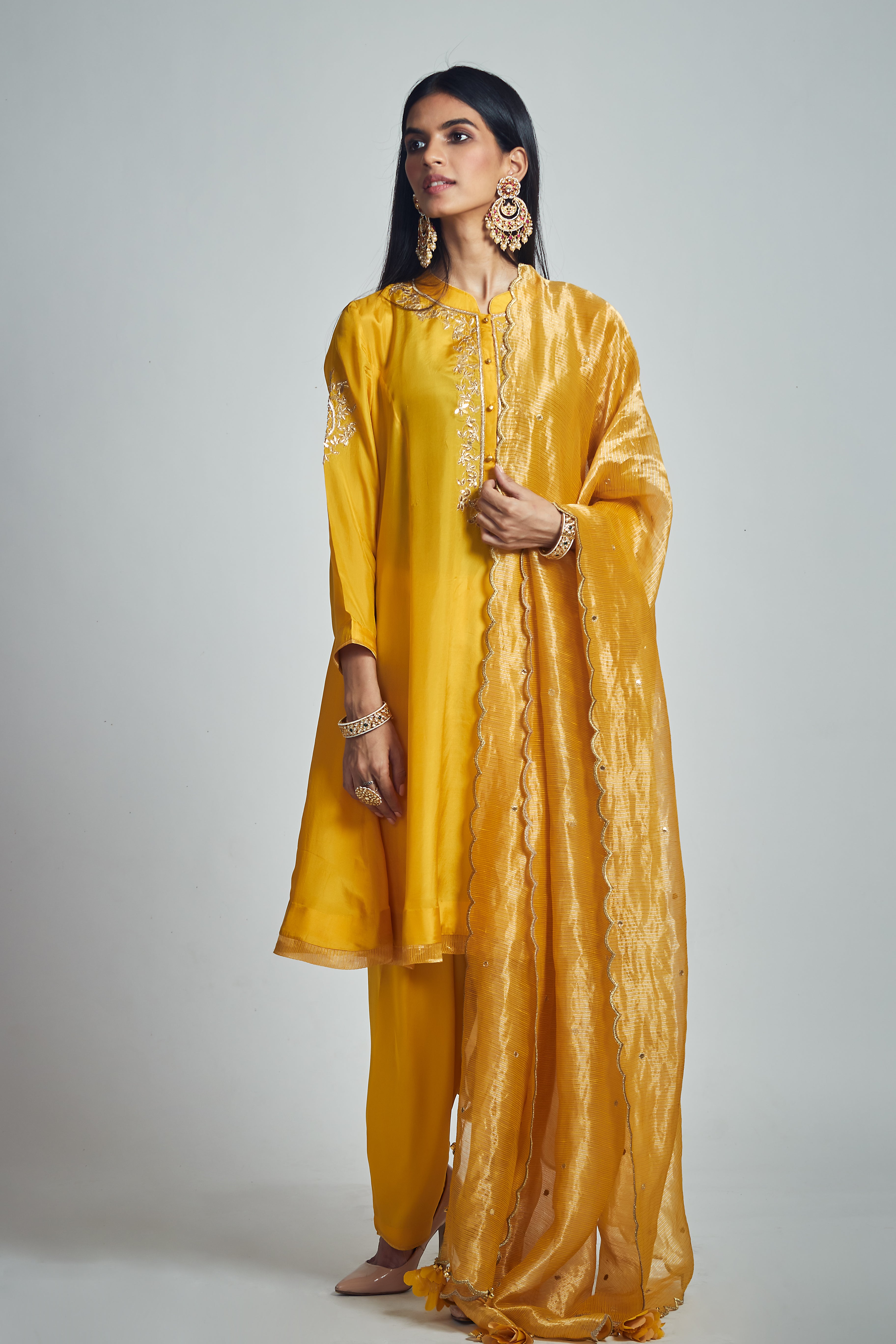 Nazish- Happy mustard Habutai silk embroidered ensemble