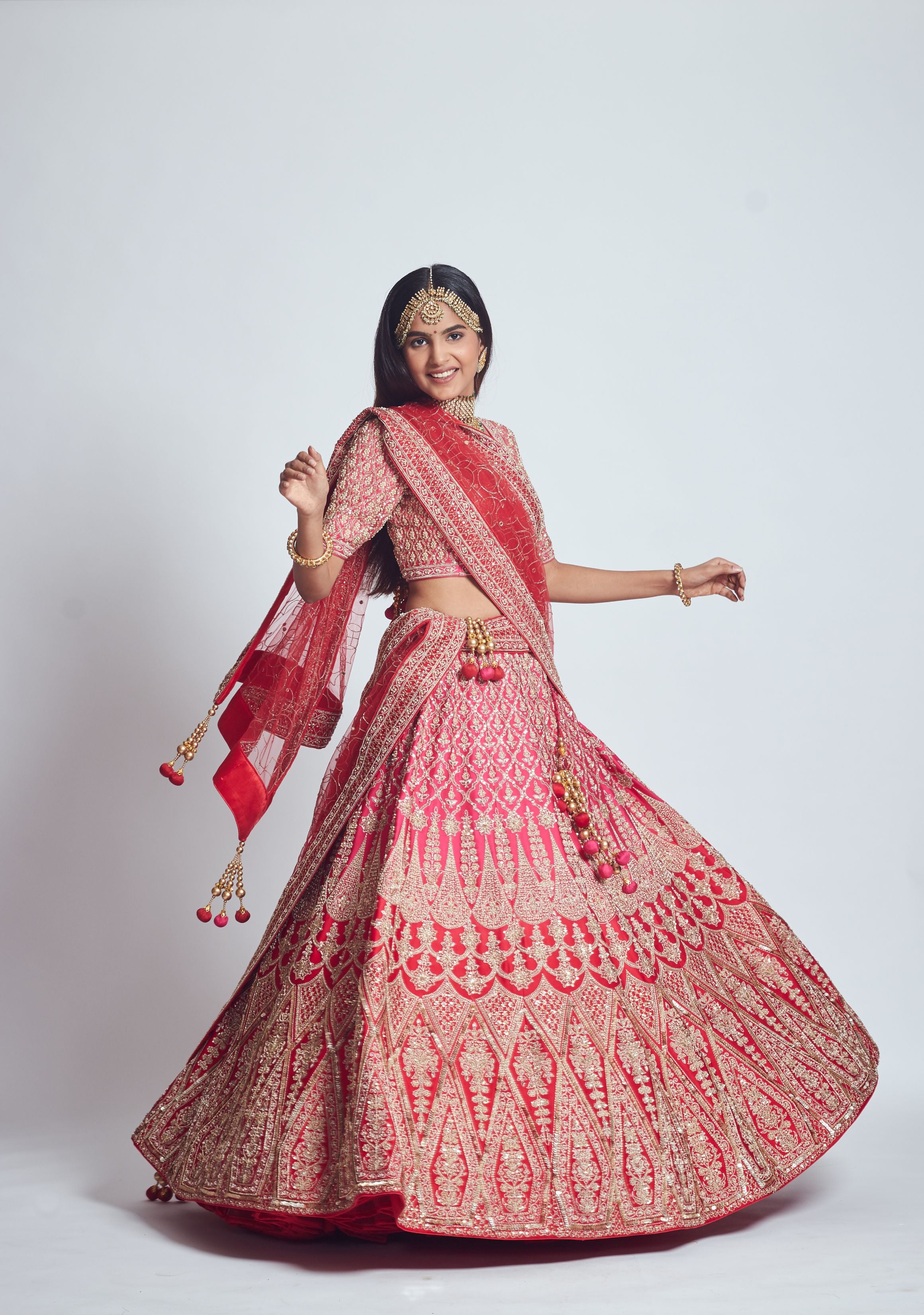 Pakeezah- Crimson red Dabka and Zardozi embroidered lehenga